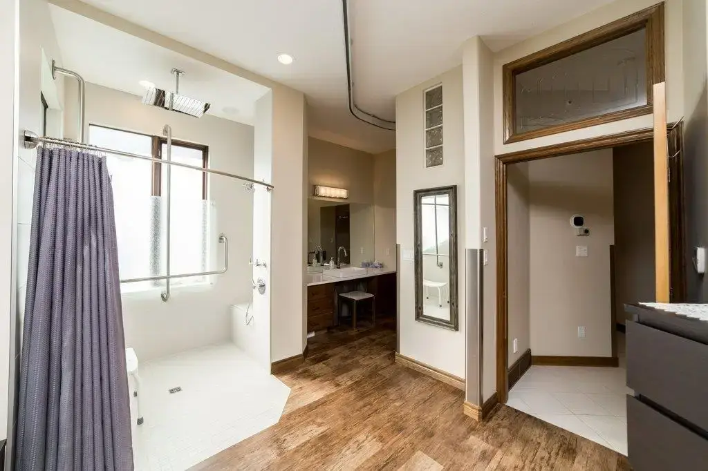 Bright, modern home bathroom interior designed for accessibility and ease of movement